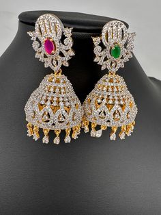 AD Jhumki Color Stone EaringsColor : Diamond Finish JhumkasSize : Approx 2.25 Inches; Weight : Approx 17 Grams EachStones : CZ --Color-- Stone Multicolor Stone Work Round Earrings, Multicolor Stone Work Earrings, Multicolor Hand Set Bollywood Earrings, Multicolor Hand Set Earrings For Festivals, Multicolor Round Jhumkas With Tilla, Multicolor Round Tilla Jhumkas, Multicolor Hand Set Jhumkas For Diwali, Multicolor Stone Work Jhumkas, Multicolor Hand Set Earrings For Diwali