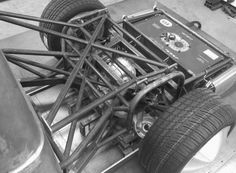 the rear end of a race car is shown in black and white