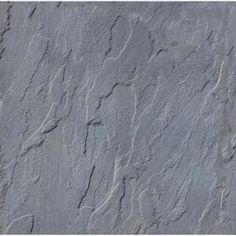 an image of a stone wall textured with grey paint that looks like it has been painted