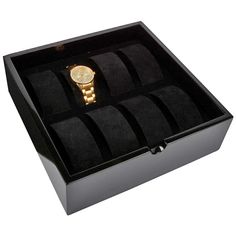 a watch in a black box on a white background