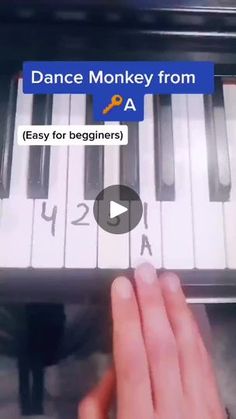 someone is playing the piano with their fingers and finger pressing it to play dance monkey from a video