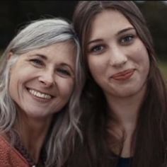 two women are smiling for the camera