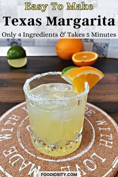 the easy to make texas margarita is served in a glass with an orange slice on top