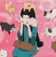 a woman sitting on top of a chair surrounded by cats and kittens in the air