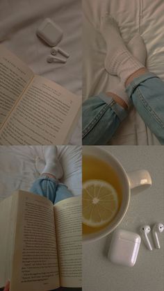 an open book, lemon and headphones on a bed with a person laying down