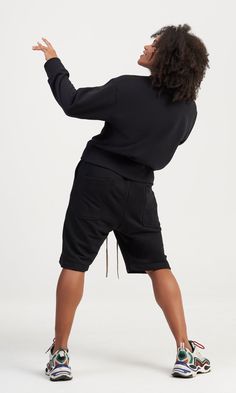 * Wide cotton shorts, which shape the bottom exquisitely and look stylish and sporty at the same time. * Featuring side pockets, back pockets and mini slits * Elastic waist gathered with strings * Combine with a top or a shirt Drawstring Cargo Shorts For Streetwear, Streetwear Drawstring Cargo Shorts, Athleisure High-waisted Shorts With Side Pockets, Athleisure High-waisted Relaxed Fit Shorts, Athleisure Shorts With Cargo Pockets, Relaxed Fit High-waisted Athleisure Shorts, Athleisure Relaxed Fit High-waisted Shorts, Loungewear High-waisted Shorts With Side Pockets, Athleisure Knee-length Shorts With Pockets