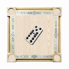 a wooden frame with two dominos on it