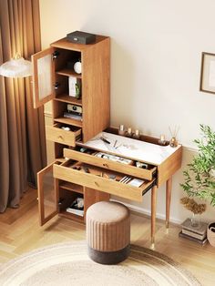 a wooden desk with drawers and shelves in a living room