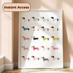 an image of a white frame with dachshunds in different colors on it