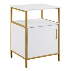 a white and gold side table with a drawer on it's bottom, against a white background