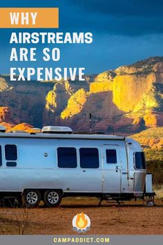 an rv parked in front of mountains with the words why airstreams are so expensive