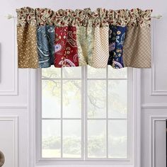 the window valance is decorated with different colors and patterns