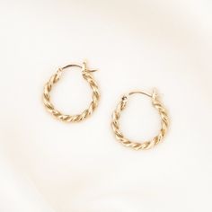 Our Rope Hoop Earrings feature a sweet, eye-catching feminine design. These hoops were thoughtfully made with enhancing your classic hoops in mind. When you are wanting something a little more than your everyday hoops, these are it! DETAILS 14k gold vermeil -or- sterling silver hoops Hoops measure 18 x 20mm Comes as a pair Safe for sensitive skin & shower safe Cute Earrings Hoops, Flower Cuff Bracelet, Twist Hoop Earrings, Love Knot Ring, Pearl Chain Necklace, Detailed Necklace, Earrings Hoops, Hoops Gold, Solid Gold Earrings