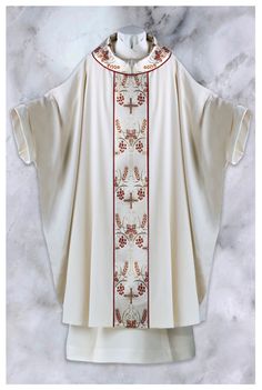 This Celebration Set of vestments tailored in our white Tropical fabric. Adorned with beautiful Brocade orphrey and trimmed in a complimentary bias. The complete set includes: Monastic, Dalmatic, Gothic, Cope, and Inside Stole. Call us for a quote! 1-800-947-7923 Fabric: Tropical Size Chart: Click Here! or Please call for custom sizing Collar: Cowl Collar Optional: Add a personalized embroidered memorial label Click Here! White Elegant Chasuble For Weddings, Tropical Fabric, Personalized Embroidered, 1 800, Custom Sizing, Size Chart, Trim, Collar, Celebrities