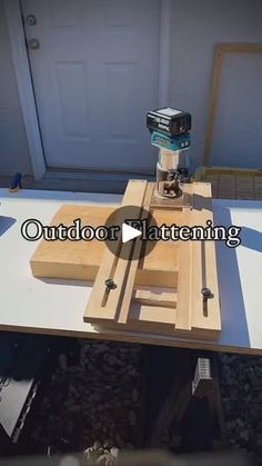 a video demonstrating how to use a router on a table top with wood planks