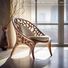 a wooden chair sitting in front of a window next to a vase with flowers on it