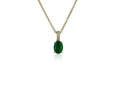 A four-prong yellow gold setting gracefully holds a verdant oval emerald in this timeless pendant. Shimmering pave-set diamonds adorn the bail, adding eye-catching sparkle. The graceful cable chain is crafted from coordinating yellow gold. Yellow Gold Setting, Blue Nile, Diamond Pendant Necklace, Gold Set, Cable Chain, Diamond Pendant, Emerald, Cable, Diamonds