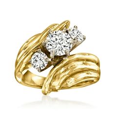 C. 1980. From our Estate collection, this glamorous bypass ring flaunts fabulous diamond sparkle and a rich radiant glow! Here, 1.20 ct. t.w. round brilliant-cut diamonds shimmer in a tasteful trio between glossy 14kt yellow gold curves. 5/8" wide. Diamond three-stone bypass ring. Exclusive, one-of-a-kind Estate Jewelry. Each Ross-Simons item arrives in a fine jewelry presentation box. Shop Ross-Simons jewelry risk-free as all items include a 30-day, 100% money-back guarantee. Stone Information Gem Type 1: Diamond Stone Color 1: G Stone Clarity 1: SI1 Stone Shape 1: Round-Shape Stone Creation Method 1: Natural Stone Weight 1: 0.75 Carats Number Of Stones 1: 1 Gem Type 2: Diamond Stone Color 2: G-H Stone Clarity 2: VS1 Stone Shape 2: Round-Shape Stone Creation Method 2: Natural Stone Weight Jewelry Presentation, Bypass Ring, Color 2, Round Brilliant Cut Diamond, Diamond Stone, Three Stone, Estate Jewelry, Type 1, Round Brilliant