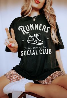 Runners Social Club Shirt Welcome to our shop! Please note the models shown in the pictures are wearing 1 or 2 sizes up, if this is your desired look, please keep sizing in mind.  All styles shown feature Comfort Colors C1717 an ultra-soft pigment dyed shirt featuring a comfy relaxed feel with 100% Cotton. Other details   .: 100% ring-spun cotton .: Heavy fabric (6.1 oz/yd² (206.8 g/m .: Relaxed fit .: Sewn-in twill label If you need any helping placing an order, please message me and I will be Relaxed Fit Sports T-shirt With Text Print, Comfortable Sports T-shirt With Graphic Print, Casual Sports T-shirt With Text Print, Casual Pre-shrunk T-shirt For Workout, Casual Pre-shrunk Athletic Fit T-shirt, Sporty Relaxed Fit T-shirt With Letter Print, Relaxed Fit Sports Activewear With Text Print, Cotton Short Sleeve Activewear With Text Print, Casual Relaxed Fit Shirt For Sports Events