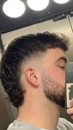 Burst fade modern mullet V Mullet Hairstyle, Modern Mullet With Beard, Burst Fade Mullet Mens, Morden Mullet Men Fade, Taper Fade Mullet Straight Hair, Mens Messy Hair, Men’s Modern Mullet Hair, High Fade Mullet