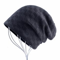 For a warm and gentle feel during winter, this knitted beanie for men and women will do the honors. The fashion cap is designed in a casual style and has a striped solid pattern. It's a high quality polyester made outdoor sports cap that you can get in either black, blue, gray or red colors.

Specifications
Item Type: Skullies & Beanies
Style: Casual
Material: Polyester
Model Number: C107
Gender: Unisex
Brand Name: GeraldBlack
Pattern Type: Solid
Department Name: Adult
Item Type: Skullies & Bean Slouchy Cotton Beanie For Winter, Casual Slouchy Winter Hat, Casual Slouchy Bonnet For Cold Weather, Casual Warm Slouchy Bonnet, Warm Slouchy Casual Bonnet, Casual Lightweight Beanie One Size, Casual Warm Bonnet For Outdoor, Casual Soft Knit Hat, Casual Winter Hat, One Size