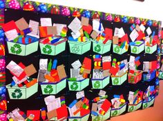 a bulletin board is decorated with colorful boxes