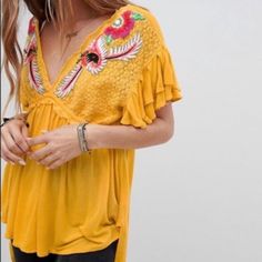 New Free People Fiesta Nueva Top Yellow Xs | Color: Pink/Yellow | Size: Xs | Yellow Bohemian Tops With Floral Embroidery, Bohemian Yellow Tops With Floral Embroidery, Casual Yellow Top With Floral Embroidery, Casual Yellow Tops For Brunch, Yellow Summer Tops For Brunch, Mustard Bohemian Top, Yellow Floral Embroidery Tops For Vacation, Mustard Summer Top For Brunch, Mustard Top For Summer Brunch