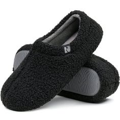 two black slippers sitting on top of each other