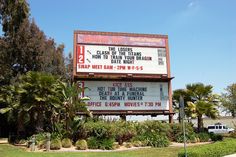 an old theater sign advertising the upcoming show