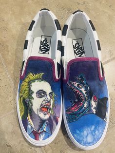 Custom Beetlejuice Vans These hand drawn shoes are one of a kind! I used various mediums on the shoe canvas including copic markers, pens, and acrylic paints. They were then professionally sealed so that the artwork is water resistant. However, we strongly recommend wearing them during dry conditions to preserve the integrity of the art as much as possible.  -Iconic Slip-On shoe -Low profile canvas uppers -Supportive padded collars -Elastic side accents -Signature rubber waffle outsoles Size: 8.5 Mens (US)/ 10 Womens (US) Only 1 Pair Available! The ones pictured are the exact ones you will receive. Please feel free to message me if you have any questions. Artistic Hand Painted Slip-on Custom Sneakers, Artistic Hand-painted Slip-on Sneakers, Drawn Shoes, Beatle Juice, Alice In Wonderland Drawings, Painted Jeans, Sneakers Athletic, Vans Slip On, Copic Markers