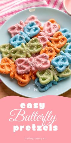 the words easy butterfly pretzels are displayed on a plate