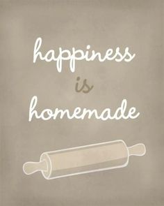 the words happiness is homemade written in white on a gray background with a rolling pin