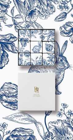 an image of a blue and white wallpaper with flowers on it's side