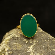 Emerald Green Jade Ring | Green Stone Statement Ring | 925 Sterling Silver 24K Gold Plated | Oval Birthstone Ring | Dainty Gift Our shop offer free ring sizing Handcrafted hammered ring Metal : 925 Sterling Silver Plating : 24K Gold Band Width : 2 mm Gem Size : 18 X 12 mm Ring Weight : 4.9 grams Ring Size : US 6 (The size you want is made for free). (We used the US standard sizing) **Custom Orders is Made** As pellada family, we will be happy to help you if you contact us with the photo and dime Gold Emerald Cabochon Ring Gift, Oval Cabochon Emerald Ring Gift, Handmade Spiritual Oval Emerald Ring, Emerald Oval Cabochon Ring Gift, Handmade Gold Oval Emerald Ring, Gold Emerald Oval Ring For Gift, Handmade Oval Emerald Heirloom Ring, Handmade Heirloom Oval Emerald Ring, Heirloom Oval Emerald Ring Handmade