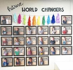 an office cubicle decorated with pictures and tassels for children's world changers