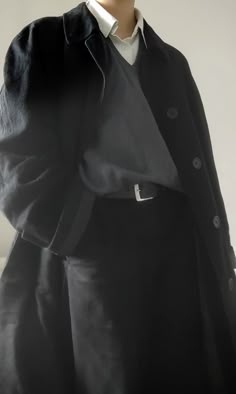 outfit idea, long black coat, white dress shirt with a blue-grey sweater vest on top, black trousers, black belt with a silver clasp Dark Academia Boy, Dark Academia Aesthetic Outfit Men, Dark Academia Outfit Men, Black Inspired Outfits, Dark Academia Outfits Men, Dark Academia Men, Male Outfits Aesthetic, Academia Aesthetic Outfit Men, Black Academia