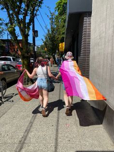 two girls walking down a street, both holding m/wearing lesbian flags towards a pride parade Pride Stuff, Woman Loving Woman, My Gf, So In Love, Human Rights, Not Mine