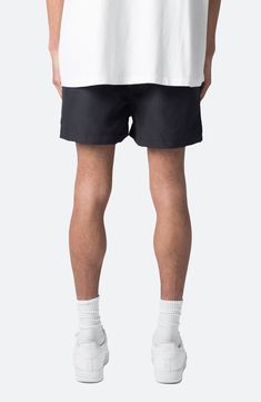 Sunny-day adventures are easy in these hardy ripstop shorts punctuated by a contrast orange drawcord handy pockets. 3" inseam; 14" leg opening; 14" front rise Elastic/drawcord-toggle waist Side-seam pockets 100% polyester Machine wash, line dry Imported Black Athletic Shorts For Summer Outdoor Activities, Black Cargo Shorts With Side Pockets For Hiking, Black Swim Trunks With Pockets For Outdoor Activities, Streetwear Swim Trunks With Pockets, Black Shorts With Functional Drawstring For Streetwear, Black Nylon Hiking Shorts, Black Bottoms With Functional Drawstring For Summer, Black Summer Bottoms With Functional Drawstring, Summer Streetwear Athletic Shorts With Functional Drawstring