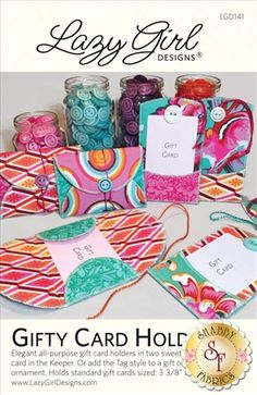 the gift card holders are made from fabric and have colorful designs on them with tags