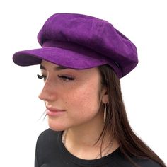 Our new CRAGGI Baker Boy Hat is made from a fabulous Purple Velvet fabric with a matching lining inside to prevent any scratching.The elasticated fitting will help you brave the wind and makes it one size fits all. This hat is a perfect fashion accessory for a day around town,holidays,Festivals and nights out with friends. Whether you're on Campus ,outdoors walking or running errands it's the perfect cap to match with your outfits. This cap is size 56-60cm with an elasticated back for a perfect Spring Visor Beret With Adjustable Fit, Adjustable Visor Beret For Winter, Adjustable Beret With Short Brim, Trendy Adjustable Brimmed Beret, Trendy One-size Beret Cap, Trendy One Size Fits Most Beret Cap, Trendy One-size-fits-most Beret Cap, Trendy Fitted Flat Cap, Trendy One Size Fits Most Beret