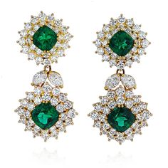 Centered by four perfectly matched green Zambian Emeralds totaling 9.08 Carats, accented by 112 Round-Brilliant Cut Diamonds totaling 12-13 Carats, and set in lush 18K Yellow Gold. These stunning earrings from Tiffany & Co are among their finest work in High Emerald Jewelry and are of superlative quality. Details: ✔ Designer: Tiffany & Co. ✔ Era: 1970's ✔ Stone: Emerald, White Diamonds ✔ Center Stones: Emerald ✔ Center-Stone Weight: 9.08 Carats (4 Emeralds) ✔ Stone Cut: Cushion ✔ Stone Color: Gr Green Quince, White Gold Drop Earrings, Tiffany Diamond, Swirl Earrings, Green Quartz, Tiffany And Co, Jewelry Brand, Emerald Stone, Emerald Jewelry