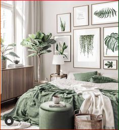 a bedroom with plants and pictures on the wall