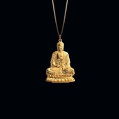 Find peace and enlightenment with our gold Buddha pendant, exquisitely crafted in the USA. Symbolizing serenity, wisdom, and spiritual awakening, each piece is a sanctuary of calm and reflection. PENDANT INFORMATIONThis pendant is made of real, solid gold.• Made in USA• Material: 14k or 18k solid gold• Finish: polished• Height: 1.28" (32,5 mm) | *includes the small circle, bail dimensions not included• Width: 0.8" (20,5 mm)• Pendant weight: approx. 6 grams (14k)• Bail: fits up to 4 mm chains• So Spiritual Hallmarked Necklaces, Yellow Gold Spiritual Necklace With Si Clarity, Spiritual Yellow Gold Jewelry For Meditation, Spiritual Gold Jewelry For Meditation, Spiritual Large Pendant Jewelry For Meditation, Yellow Gold Spiritual Necklaces For Meditation, Spiritual Yellow Gold Necklaces For Meditation, Spiritual Yellow Gold Necklace For Meditation, Buddha Pendant Necklace