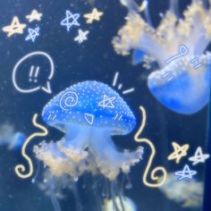 a blue jellyfish in an aquarium with bubbles and stars on it's back