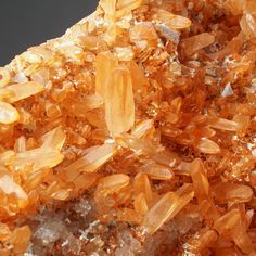 the crystals are all different colors and sizes, but one color is orange or yellow