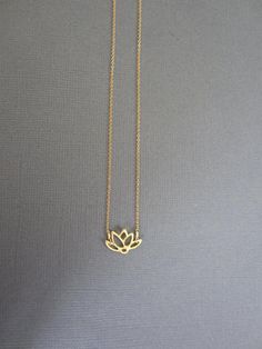 Vermeil Lotus Charm Necklace / Peridot Teardrop Briolettes / Gold filled chain / Gold filled Clasp/ Gold filled Wire *Lotus Pendant measures 13mm x 15mm *Available in Sterling Silver: *Available with Birthstone: https://www.etsy.com/listing/108151390/gold-lotus-necklace-lotus-petal-charm?ref=shop_home_active *In Buddhism the lotus flower is known to be associated with purity, spiritual awakening and faithfulness. The flower is considered pure as it is able to emerge from murky waters in the morn Delicate Charm Necklace With Adjustable Chain As Gift, Minimalist Necklace For Birthday Gift, Simple Necklace With Delicate Chain For Gift, Simple Delicate Chain Necklace For Gift, Spiritual Charm Necklace With Delicate Chain, Elegant Flower Charm Necklaces For Gifts, Elegant Adjustable Flower Necklace For Gift, Minimalist Necklace With Flower Charm For Gift, Minimalist Flower Charm Necklaces As Gifts