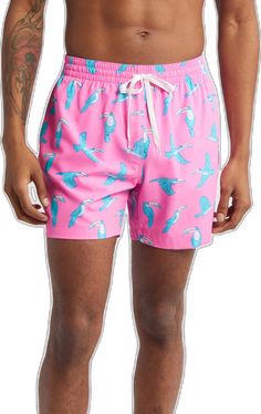 Casual Pink Swim Trunks For Swimming, Casual Pink Swimwear With Upf 50+, Pink Bottoms With Upf 50+ For Vacation, Tropical Pink Swim Trunks For Beach, Pink Summer Swim Trunks For Water Sports, Casual Pink Swimwear For Surfing, Pink Go-dry Shorts For Beach, Pink Swim Trunks For Water Sports, Casual Pink Moisture-wicking Swim Trunks