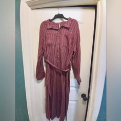 New Free People Shirt Dress. Never Worn, Rust Color Xl Rayon. Buttons And Slits Up Sides Very Pretty On. Thank You For Looking. Belted Button-up Maxi Dress For Daywear, Casual Long Sleeve Belted Maxi Dress, Casual Long Belted Maxi Dress, Belted Long Sleeve Maxi Dress For Day Out, Long Sleeve Rayon Midi Dress For Day Out, Casual Belted Maxi Shirt Dress, Long Sleeve Maxi Dress For Day Out, Free People Shirt, Button Front Shirt Dress