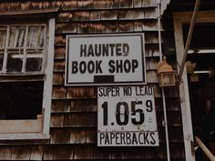 a sign on the side of a building that says, book shop super no lead 1059 paperbacks