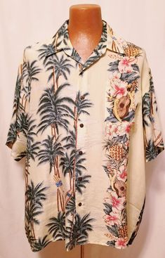 "Silk Men's Hawaiian, short Sleeve shirt in  light yellow with Palm trees and Ukuleles! One chest pocket, cocoa nut buttons. 20\" across the shoulders 11\" sleeves 25\" across chest 33\" length \"Hawaiian Company\" label Great condition Sz XL" Brown Short Sleeve Hawaiian Shirt, Hawaiian Men, Mens Short Sleeve Shirt, Light Yellow, Chest Pocket, Men Short Sleeve, Palm Trees, Short Sleeve Shirt, Sleeve Shirt